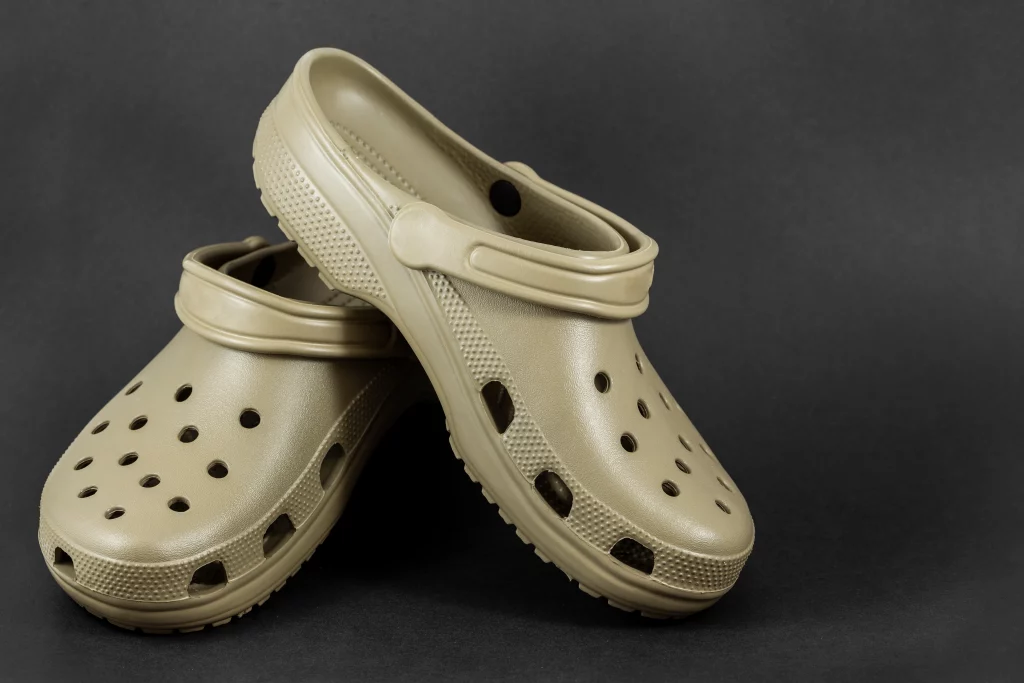 Brown crocs sitting upright